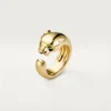 Anillo Panthere de Cartier – Oro amarillo, ónix, granate tsavorita – Cartier