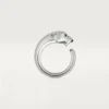 Anillo Panthere De Cartier – Oro blanco, granates tsavorita, ónix – Cartier