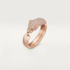 Anillo Panthere de Cartier – Oro rosa, ónix, esmeraldas, diamantes – Cartier