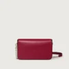 Bolso de cadena mini, Double C de Cartier – Piel de becerro rojo cereza, acabado en oro y esmalte rojo cereza – Cartier