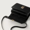 Bolso de hombro, Mini, Double C de Cartier – Piel de becerro negra, acabado en oro y esmalte negro – Cartier