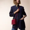 Bolso de hombro, Mini, Double C de Cartier – Piel de becerro rojo cereza, acabado en oro y esmalte rojo cereza – Cartier