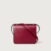 Bolso de hombro, Mini, Double C de Cartier – Piel de becerro rojo cereza, acabado en oro y esmalte rojo cereza – Cartier