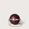 Bolso redondo con motivo gadroón, Cartier Soir