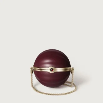 Bolso redondo con motivo gadroón, Cartier Soir