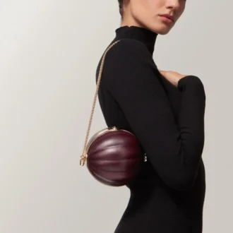 Bolso redondo con motivo gadroón, Cartier Soir