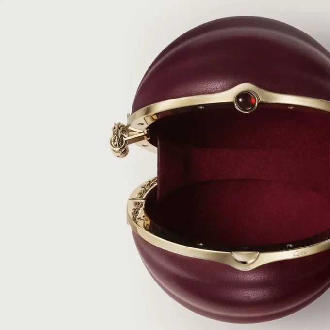 Bolso redondo con motivo gadroón, Cartier Soir