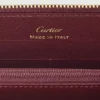 Cartera internacional con cremallera, Must De Cartier – Piel de becerro burdeos, acabado dorado – Cartier