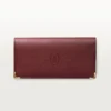Cartera internacional con fuelles, Must de Cartier – Piel de becerro burdeos, acabado dorado – Cartier