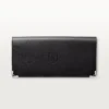 Cartera internacional con fuelles, Must de Cartier – Piel de becerro negra, acabado en acero inoxidable – Cartier