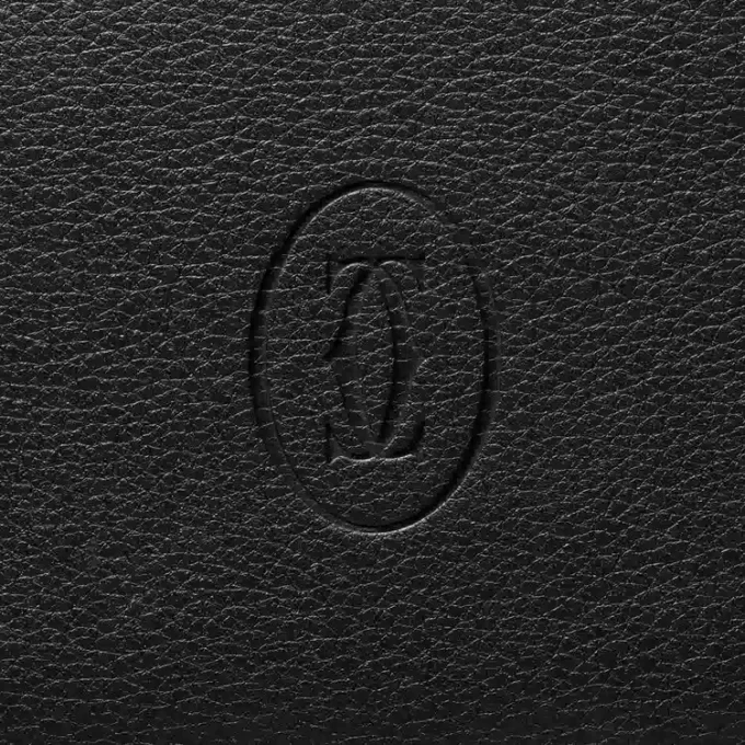 Cartera internacional con fuelles, Must de Cartier – Piel de becerro negra, acabado en acero inoxidable – Cartier