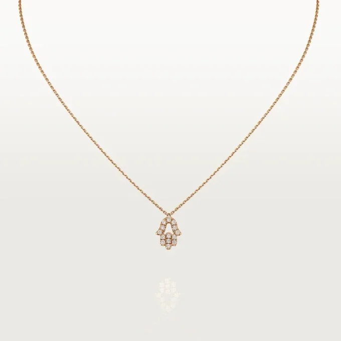 Colgante «Corazones y símbolos» – Oro rosa, diamantes – Cartier