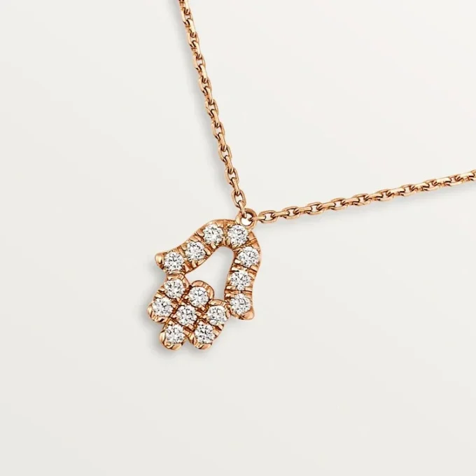 Colgante «Corazones y símbolos» – Oro rosa, diamantes – Cartier