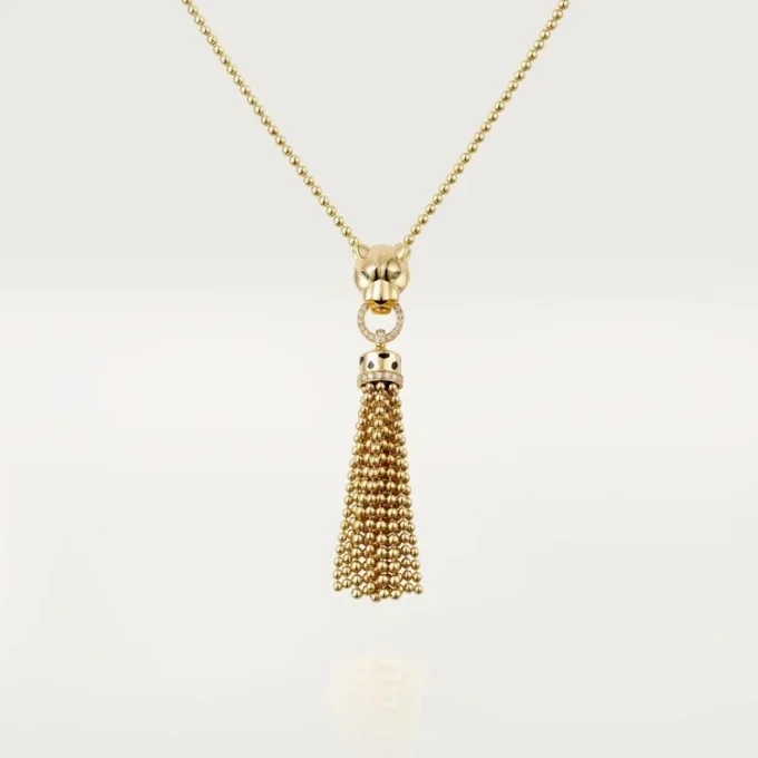 Collar Panthere de Cartier – Oro amarillo, laca negra, granates tsavorita, ónix, diamantes – Cartier