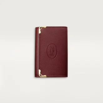 Llavero de 6 llaves, Must De Cartier – Piel de becerro burdeos, acabado dorado – Cartier