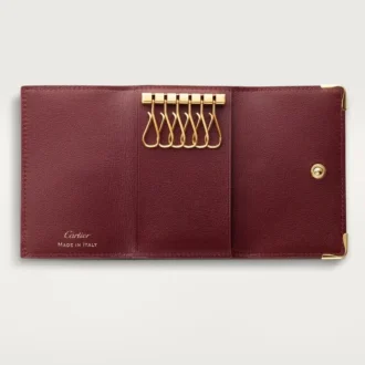 Llavero de 6 llaves, Must De Cartier – Piel de becerro burdeos, acabado dorado – Cartier