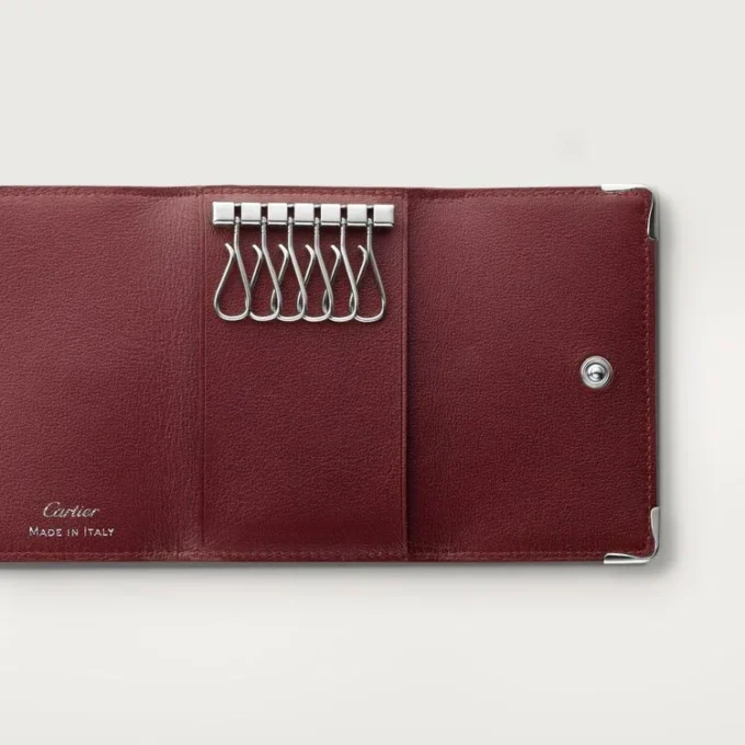 Llavero de 6 llaves, Must de Cartier – Piel de becerro negra, acabado en acero inoxidable – Cartier