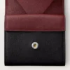 Monedero cuadrado, Must De Cartier – Piel de becerro negra, acabado en acero inoxidable – Cartier