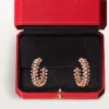 Pendientes de aro Clash De Cartier – Oro rosa, pequeños | Cartier EE. UU.