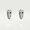 Pendientes pequeños de aro Panthere Diamond, oro blanco | Cartier EE. UU.