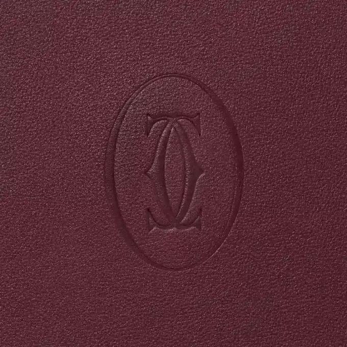 Portafolio, Must De Cartier – Piel de becerro burdeos, acabado dorado – Cartier