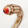 Pulsera de alta joyería – Oro rosa, coral, ónix, laca negra, diamantes – Cartier