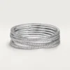 Pulsera Etincelle de Cartier, con medio pavé