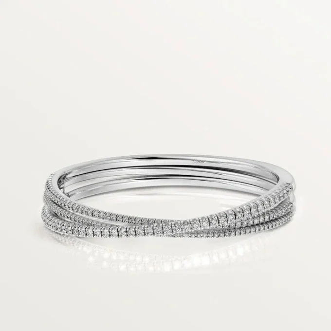 Pulsera Etincelle de Cartier, con medio pavé