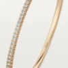 Pulsera Etincelle de Cartier, con medio pavé