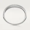 Pulsera Etincelle de Cartier, con medio pavé