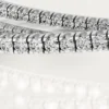 Pulsera Etincelle de Cartier, con medio pavé