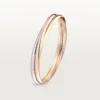 Pulsera Trinity en oro tricolor, modelo clásico | Cartier EE. UU.